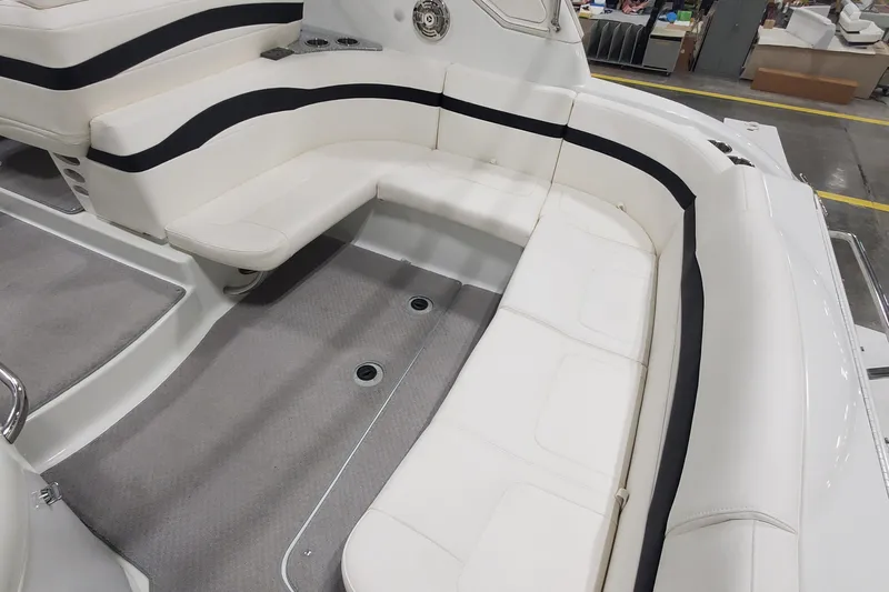  Yacht Photos Pics 2010 Formula 31 Performance Cruiser interior with white seating and black accents.