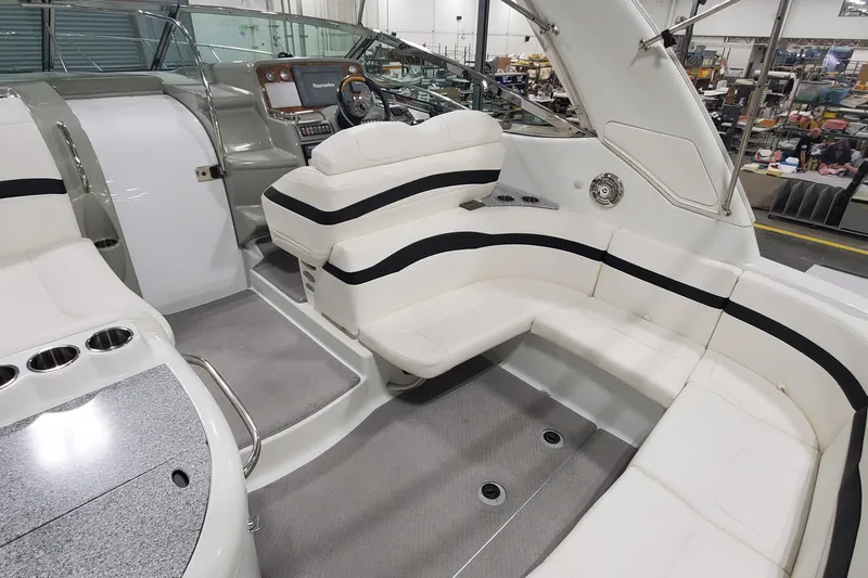  Yacht Photos Pics 2010 Formula 31 Performance Cruiser interior with plush seating and modern dashboard.