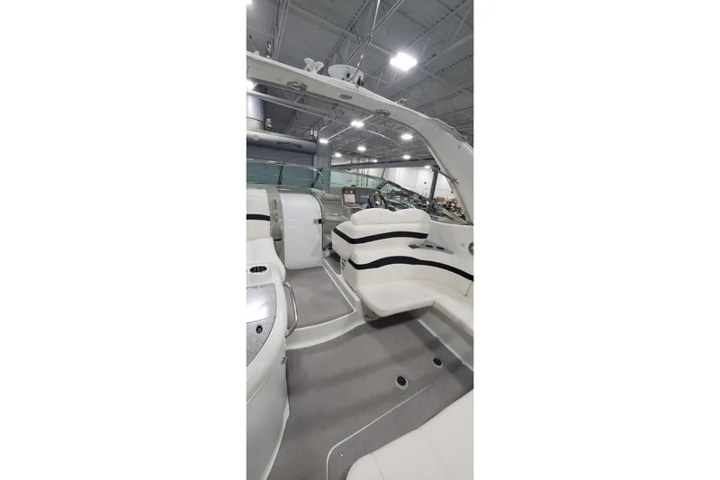  Yacht Photos Pics 2010 Formula 31 Performance Cruiser interior with white seating and modern design.