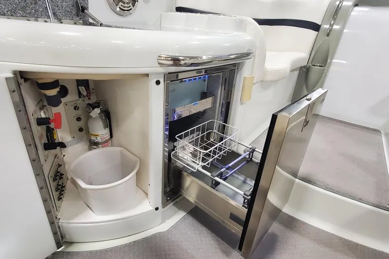  Yacht Photos Pics 2010 Formula 31 Performance Cruiser interior with open storage and appliance compartments.