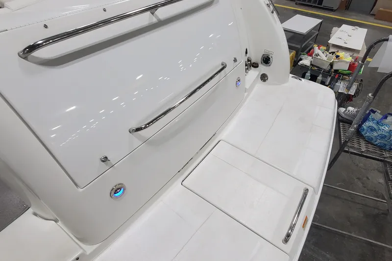  Yacht Photos Pics 2010 Formula 31 Performance Cruiser, white deck with stainless steel railings.