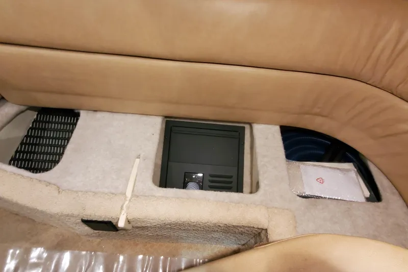  Yacht Photos Pics Interior view of a 2010 Formula 31 Performance Cruiser, featuring seating and storage compartments.