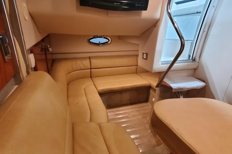  Yacht Photos Pics 2010 Formula 31 Performance Cruiser interior with beige seating and modern design.