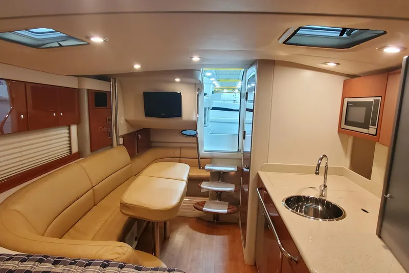  Yacht Photos Pics Luxurious interior of 2010 Formula 31 Performance Cruiser with modern amenities and elegant design.