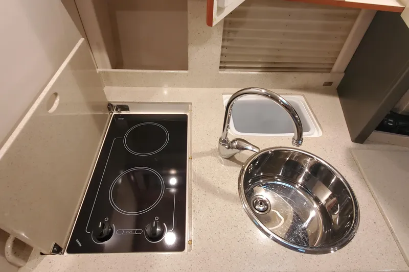  Yacht Photos Pics 2010 Formula 31 Performance Cruiser kitchen with stove and sink.