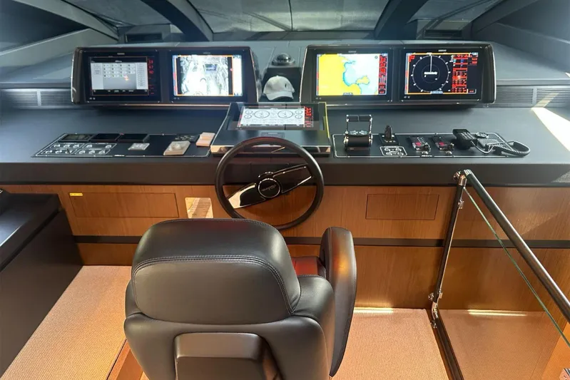 Yacht Photos Pics 2024 Riva 102' Corsaro Super yacht helm with advanced navigation displays and controls.