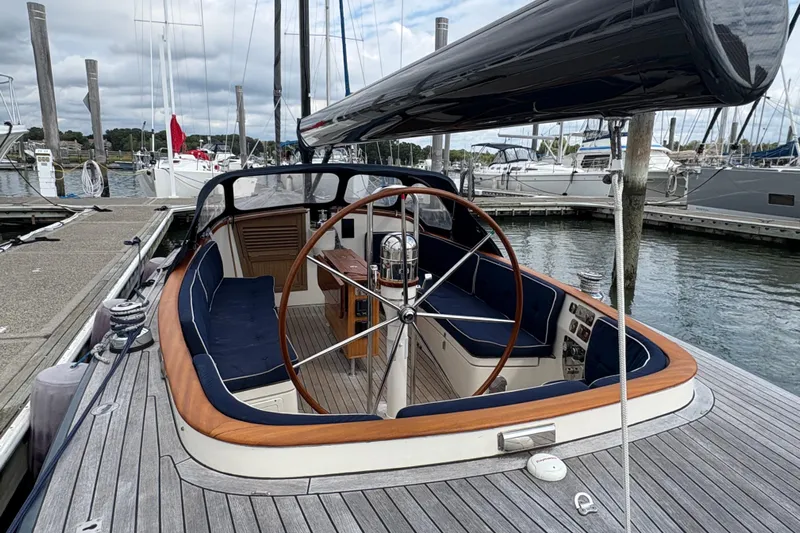 Arethusa Yacht Photos Pics Luxurious 2017 Leonardo Eagle 44 yacht docked at marina, featuring elegant wooden deck and spacious cockpit.