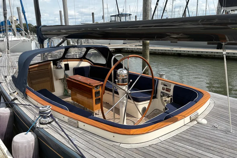 Arethusa Yacht Photos Pics Luxury sailboat Leonardo Eagle 44, 2017 model, docked with elegant wooden and navy interior.