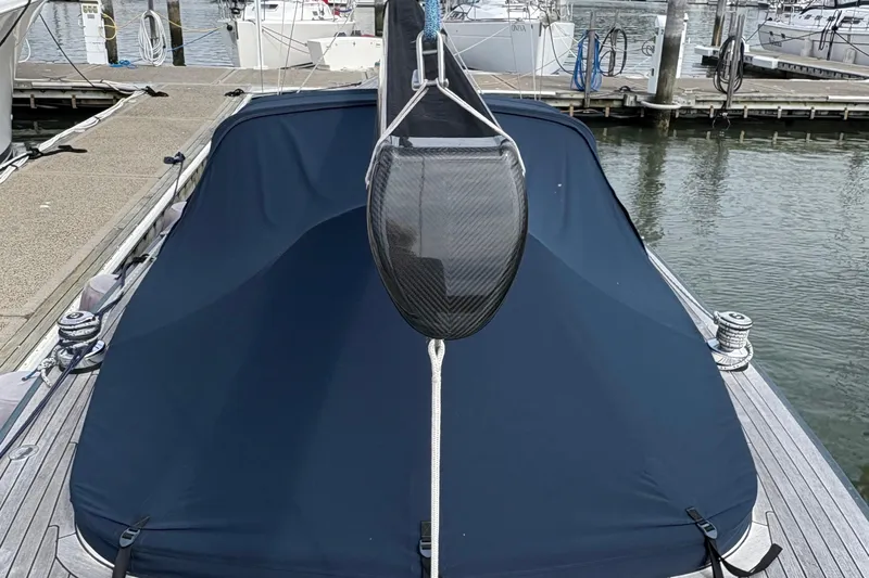 Arethusa Yacht Photos Pics Leonardo Eagle 44 sailboat, 2017 model, docked with a blue cover on deck.