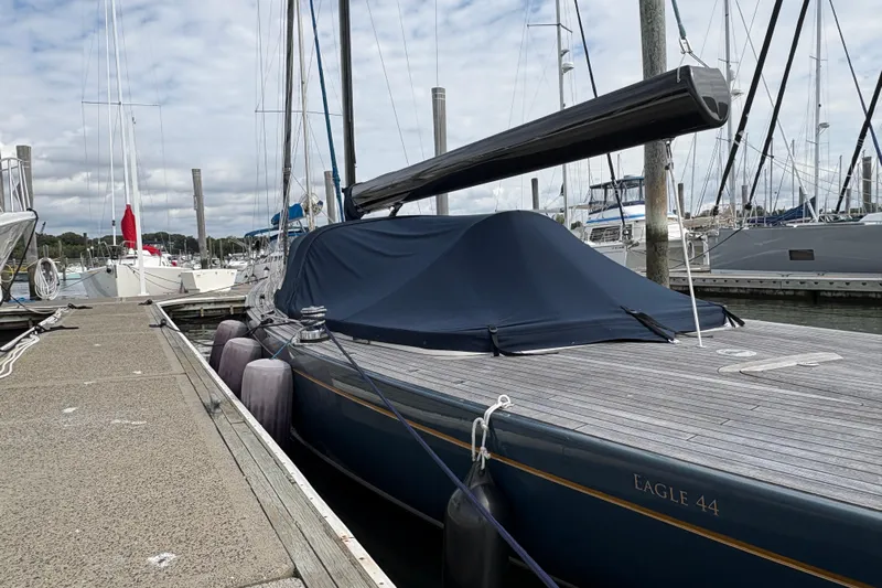 Arethusa Yacht Photos Pics Sailboat Leonardo Eagle 44, 2017 model, docked at marina with cover.