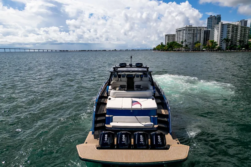  Yacht Photos Pics Luxury Dutch American DA 53 yacht cruising near city skyline, 2025 model.