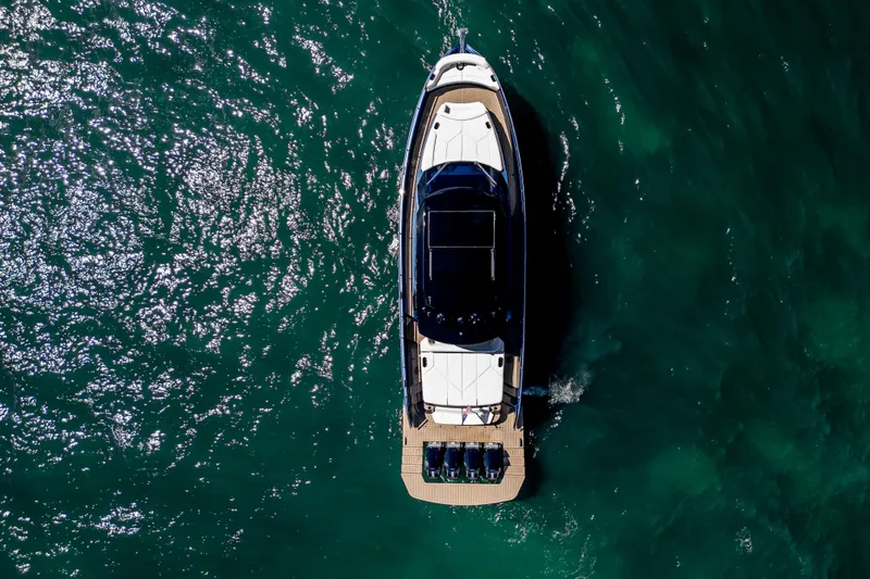  Yacht Photos Pics Aerial view of 2025 Dutch American DA 53 yacht on vibrant blue water.