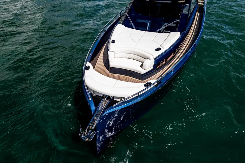  Yacht Photos Pics Luxurious 2025 Dutch American DA 53 yacht with sleek design on open water.