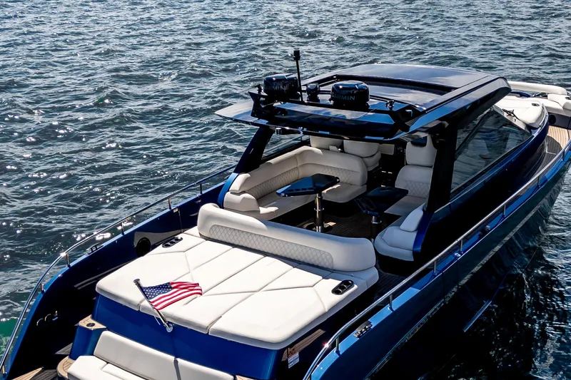  Yacht Photos Pics Luxurious 2025 Dutch American DA 53 yacht cruising on open water.