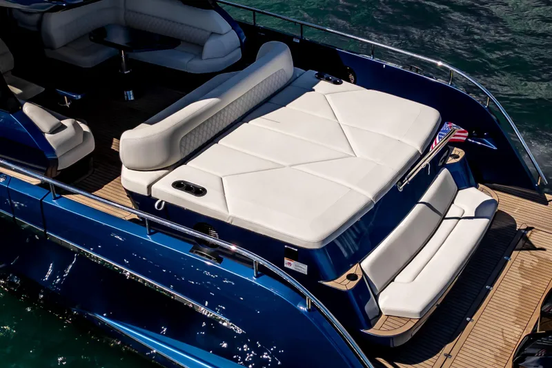  Yacht Photos Pics Luxurious 2025 Dutch American DA 53 yacht with elegant seating and sleek design on the water.