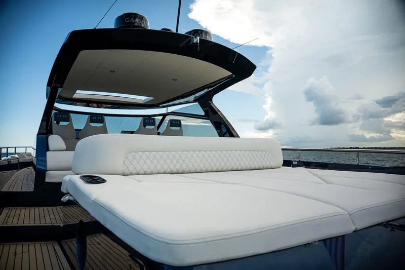  Yacht Photos Pics Luxurious 2025 Dutch American DA 53 yacht with elegant seating and ocean view.
