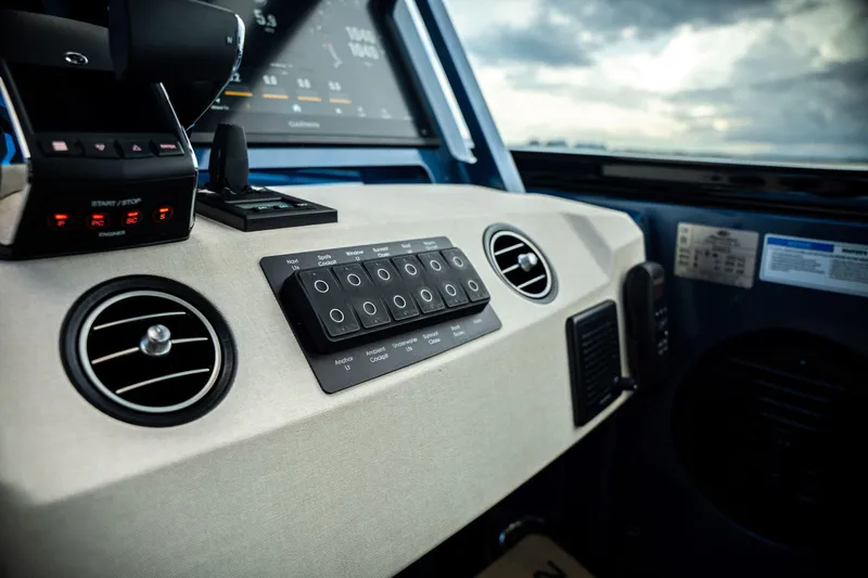  Yacht Photos Pics Control panel of 2025 Dutch American DA 53 boat with switches and gauges.