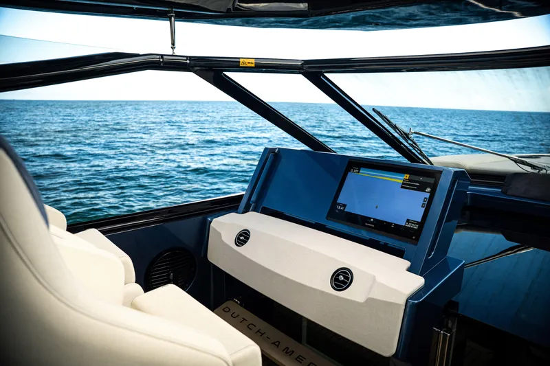  Yacht Photos Pics Interior view of 2025 Dutch American DA 53 yacht with ocean backdrop.