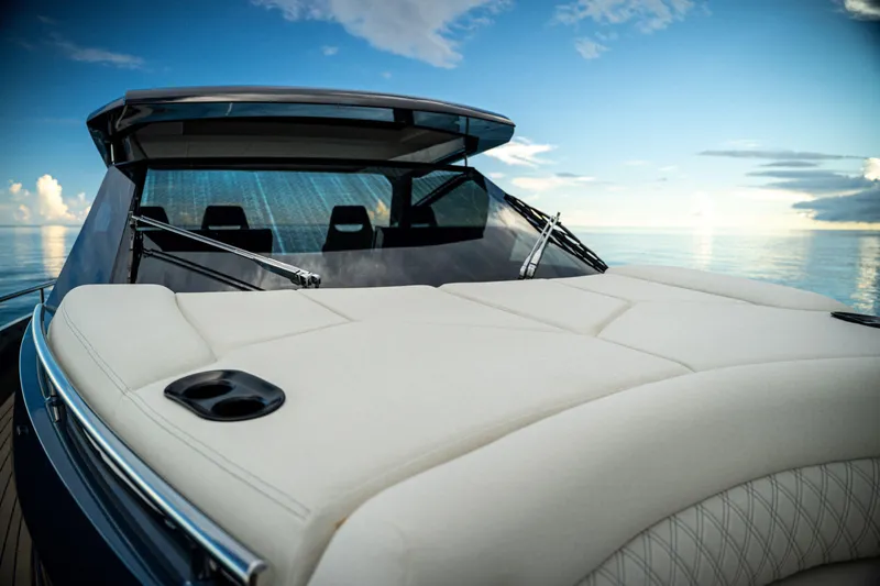  Yacht Photos Pics Luxurious 2025 Dutch American DA 53 yacht with sleek design on calm ocean waters.