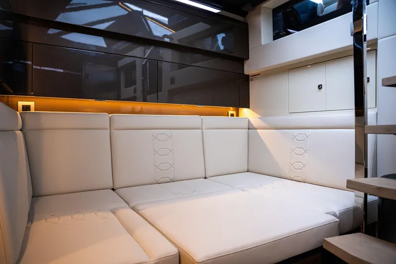  Yacht Photos Pics Luxurious interior of 2025 Dutch American DA 53 yacht with elegant white seating.