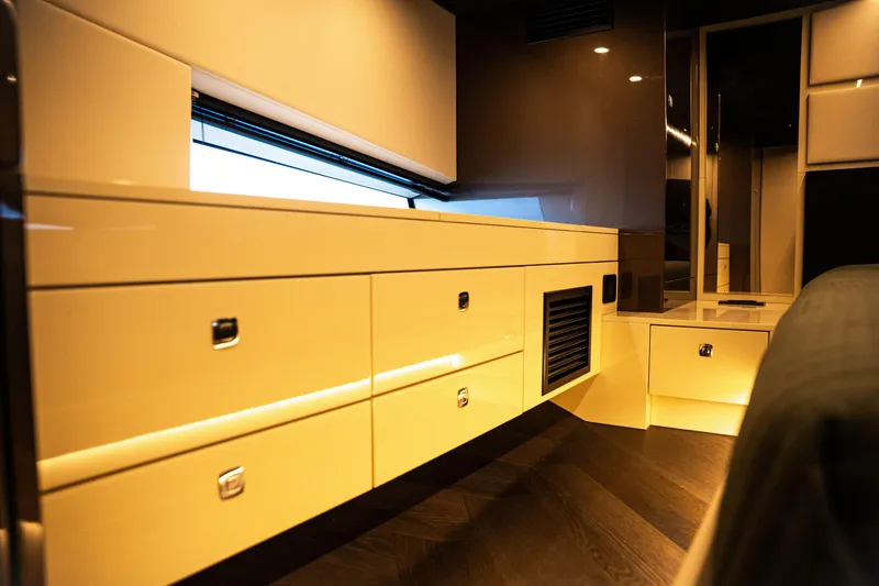  Yacht Photos Pics Luxurious interior of 2025 Dutch American DA 53 yacht with sleek cabinetry and ambient lighting.