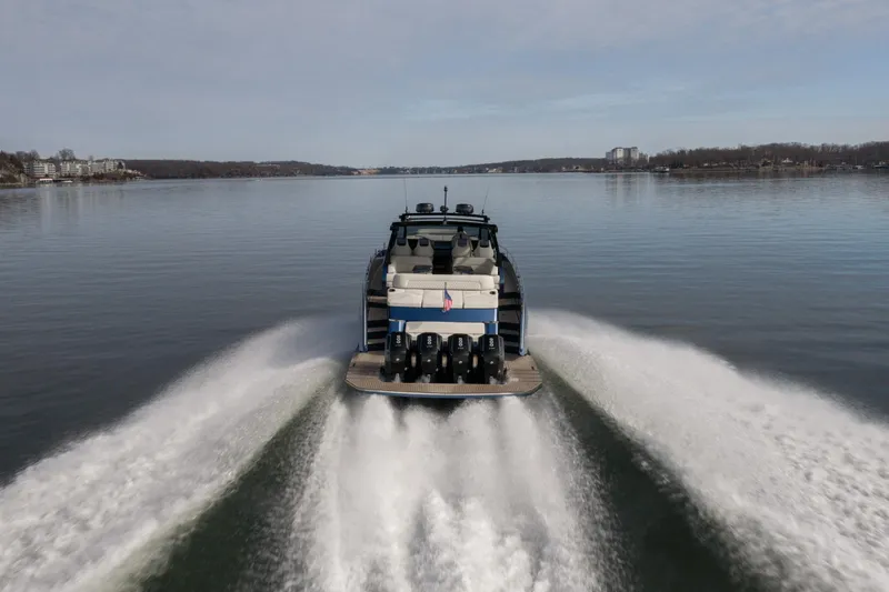  Yacht Photos Pics High-speed Dutch American DA 53 boat cruising on a serene lake, 2025 model.