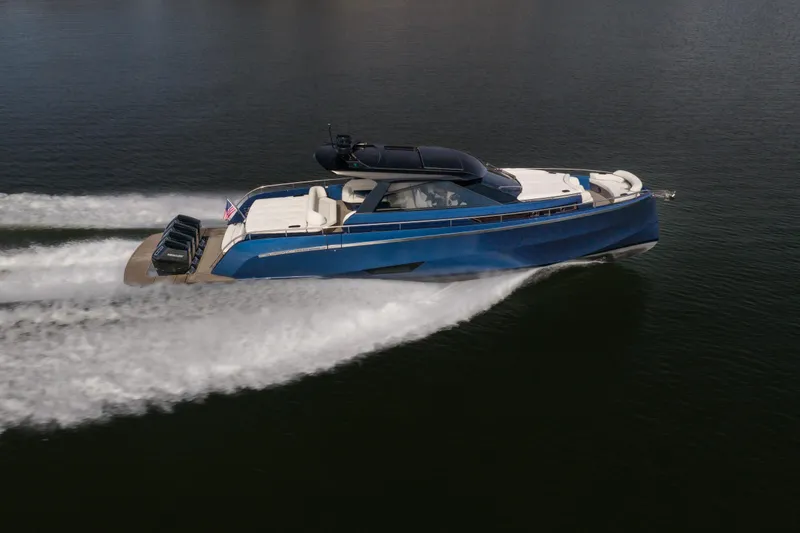  Yacht Photos Pics 2025 Dutch American DA 53 yacht cruising on open water, showcasing sleek design and powerful engines.