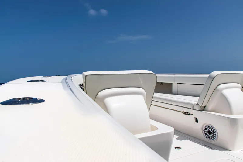  Yacht Photos Pics 2025 SeaVee 400Z boat interior with white seating under clear blue sky.
