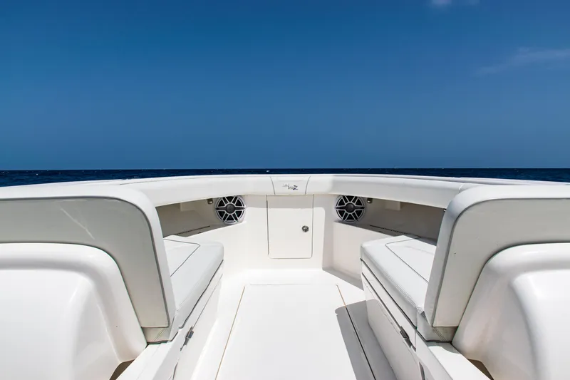  Yacht Photos Pics 2025 SeaVee 400Z boat interior with white seating and ocean view.