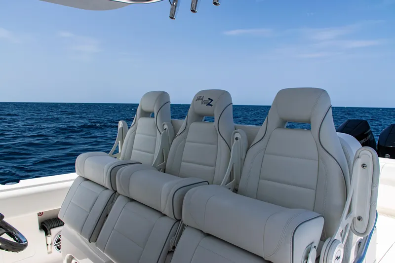  Yacht Photos Pics 2025 SeaVee 400Z boat with luxurious seating, cruising on open ocean waters.