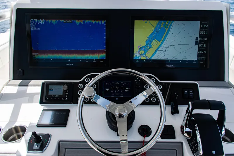  Yacht Photos Pics Helm of 2025 SeaVee 400Z with advanced navigation displays and controls.