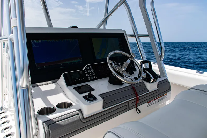  Yacht Photos Pics 2025 SeaVee 400Z boat dashboard with modern controls and ocean view.