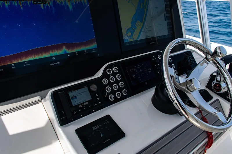  Yacht Photos Pics 2025 SeaVee 400Z boat dashboard with advanced navigation and control systems.