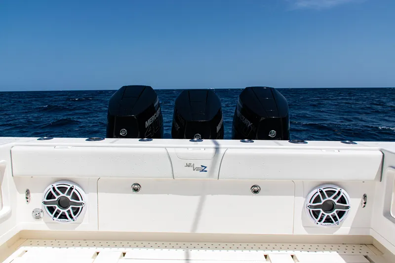  Yacht Photos Pics 2025 SeaVee 400Z boat with triple Mercury engines on open ocean.