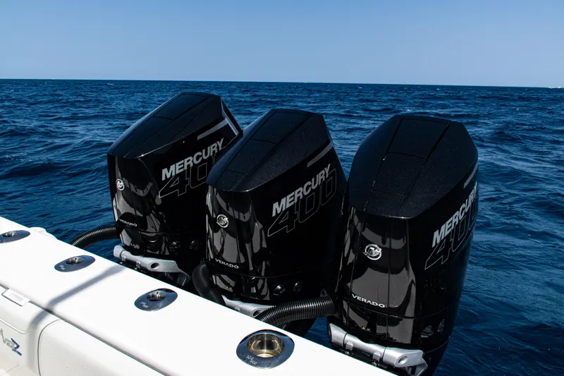  Yacht Photos Pics Triple Mercury 400 outboard engines on a 2025 SeaVee 400Z boat in open water.