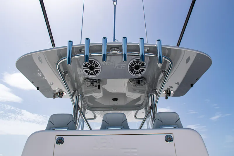  Yacht Photos Pics 2025 SeaVee 400Z boat with sleek design and advanced features under a clear blue sky.