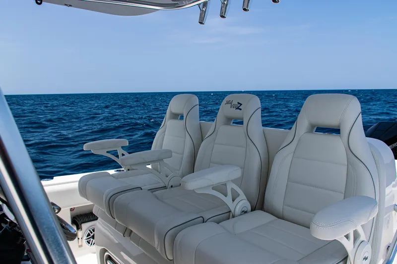  Yacht Photos Pics Luxury seating on 2025 SeaVee 400Z boat with ocean backdrop.