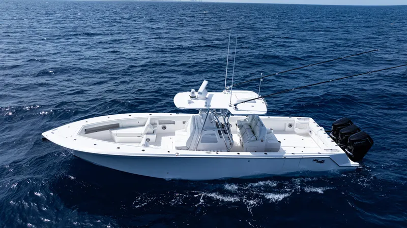  Yacht Photos Pics 2025 SeaVee 400Z boat cruising on open ocean waters.
