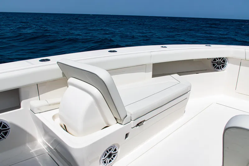  Yacht Photos Pics 2025 SeaVee 400Z boat interior with white seating, ocean view.