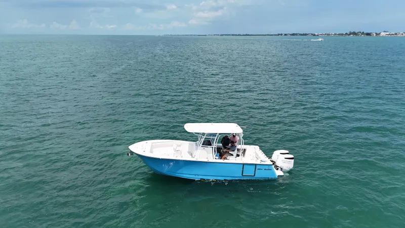  Yacht Photos Pics 2024 Sea Born SX281 Offshore LE boat cruising on open water.