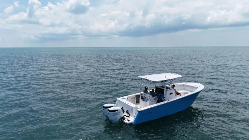  Yacht Photos Pics 2024 Sea Born SX281 Offshore LE boat cruising on open water.