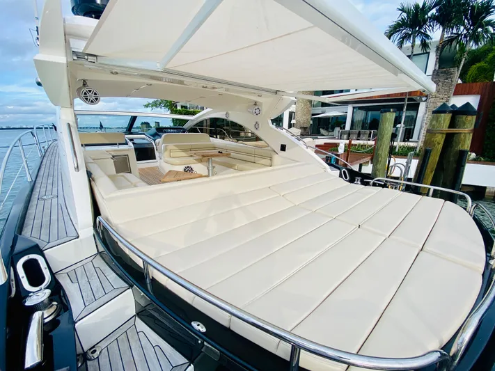 Essence Yacht Photos Pics Sunseeker Predator 60 yacht 2010 model with spacious deck and luxurious seating.