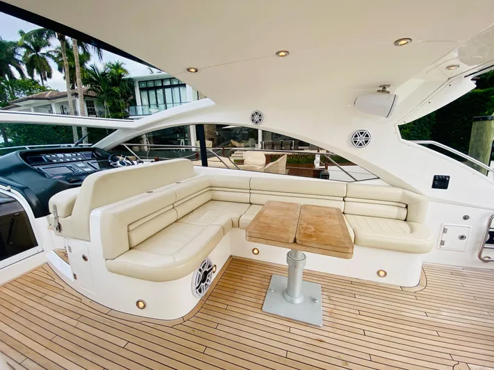 Essence Yacht Photos Pics Luxurious seating area on a 2010 Sunseeker Predator 60 yacht.