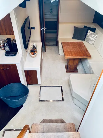 Essence Yacht Photos Pics Sunseeker Predator 60 2010 yacht interior with modern seating and dining area.