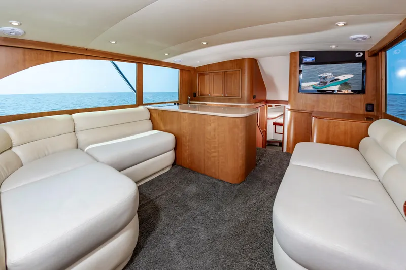 Sea Horse Yacht Photos Pics Luxurious interior of 1994 Custom Carolina 43 Blackwell Convertible yacht with ocean view.