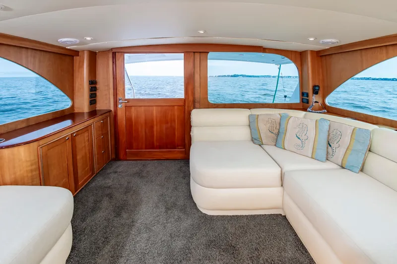 Sea Horse Yacht Photos Pics Luxurious interior of 1994 Custom Carolina 43 Blackwell Convertible yacht with ocean view.