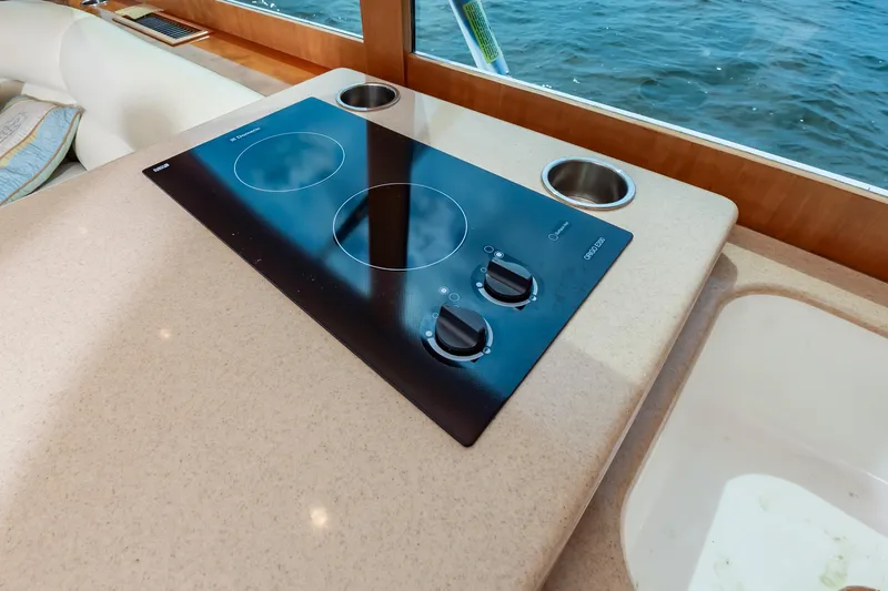 Sea Horse Yacht Photos Pics Stovetop on 1994 Custom Carolina 43 Blackwell Convertible yacht with ocean view.