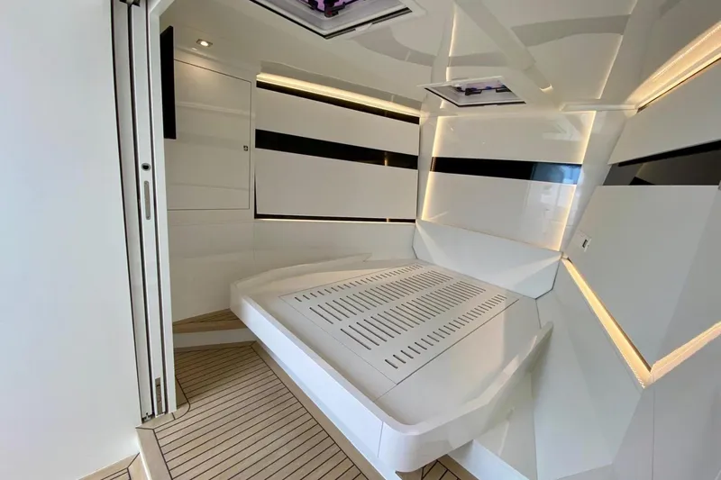  Yacht Photos Pics Luxurious interior of 2025 VanDutch 48 yacht, featuring sleek modern design and ambient lighting.