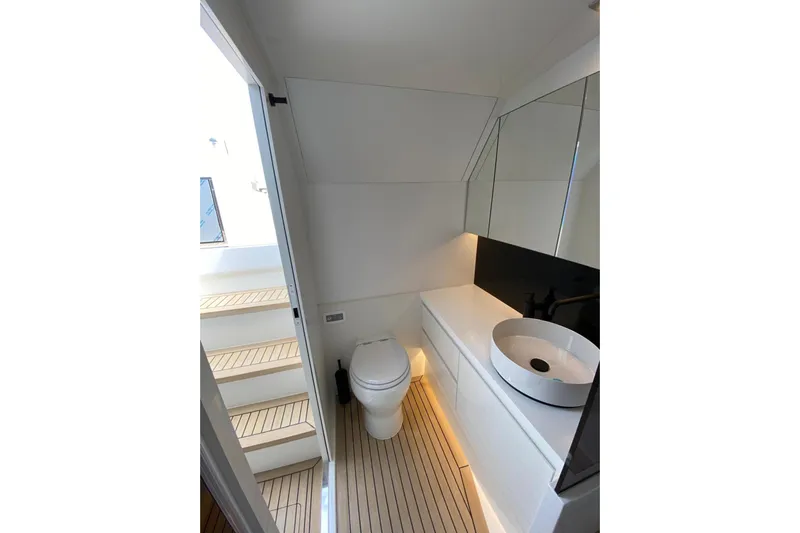  Yacht Photos Pics Modern bathroom interior on 2025 VanDutch 48 yacht, featuring sleek design and elegant fixtures.