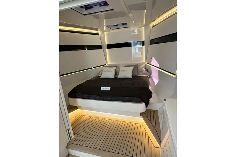  Yacht Photos Pics Luxurious interior cabin of 2025 VanDutch 48 yacht with modern design and ambient lighting.